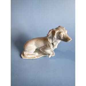 Vintage Kaiser Porcelain Figurine Of A Sitting Dog  Handcrafted White Ceramic De